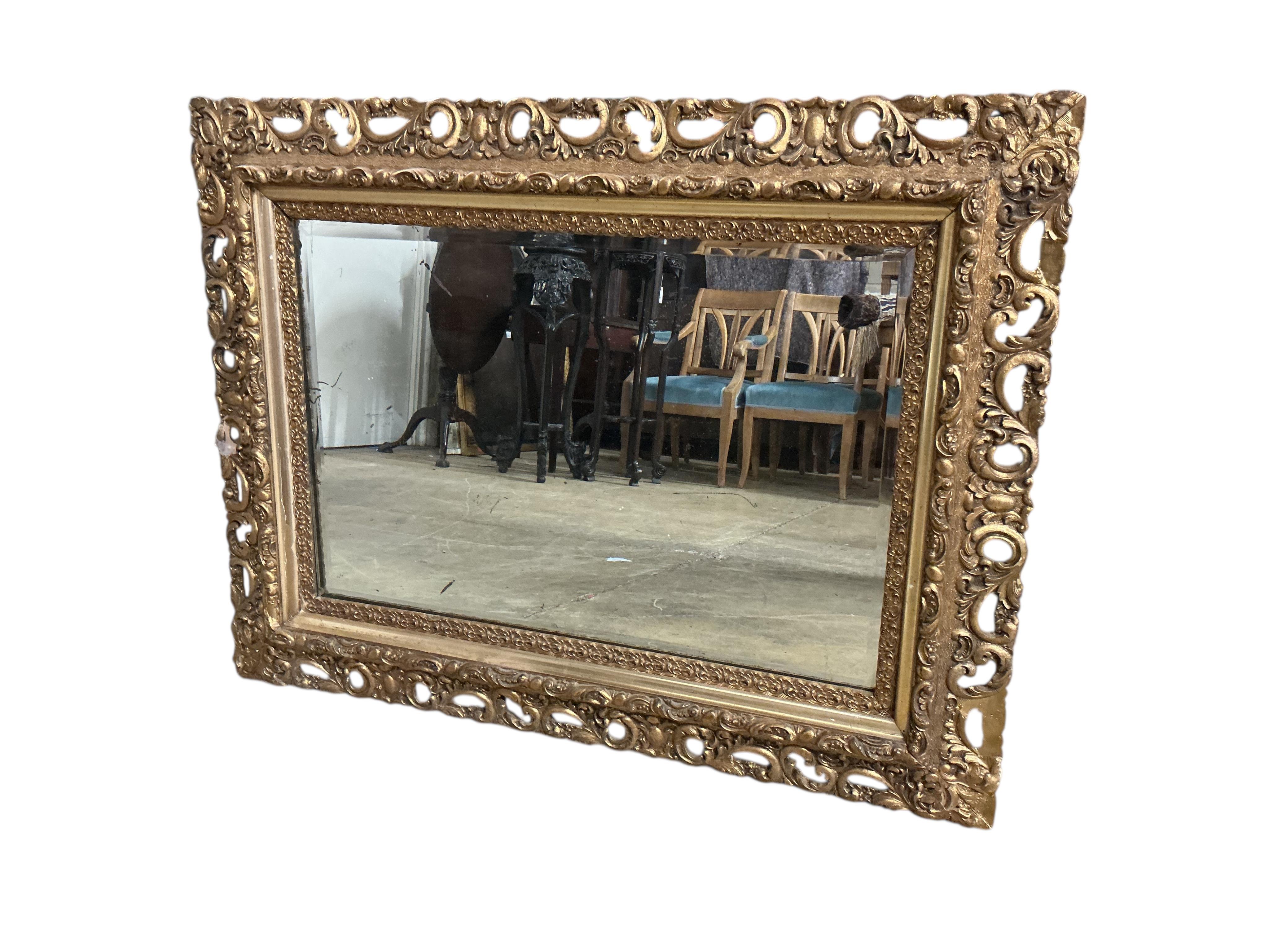 A Victorian carved giltwood rectangular wall mirror, width 103cm, height 79cm